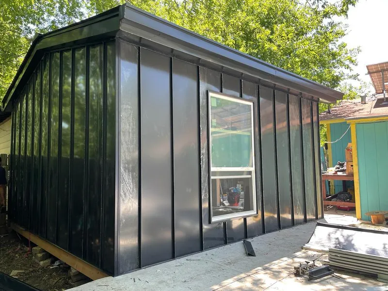 Black standing seam metal wall panels for Metal Roof Installation in Elbridge